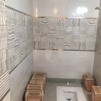 کاشی کاری و سرامیک کاری (کار با چسب و سیمان)