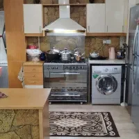 کابینت تقریبا ۸ متر همراه هود وسینک و دیوارپوش ها