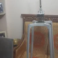 یک عدستگاه دستی برای سیب زمینی کبابی