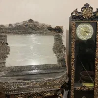 ساعت و آینه و کنسول