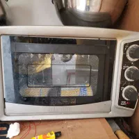 اون توستر به همراه جارو برقی