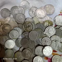 حدود ۱۰۰تاسکه یک ریالی شاهی و۴۰تا یه ریالی جمهوری