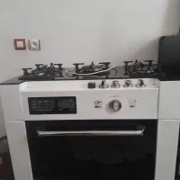 اجاق گاز و میز تلویزیون