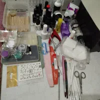 تمامی وسایل کاشت ناخن به همراه دستگاه نو