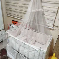 گهواره نوزاد نی‌نی لای لای