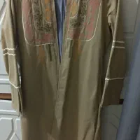 تعداد زیادی لباس زنانه|لباس|رشت, منظریه|دیوار