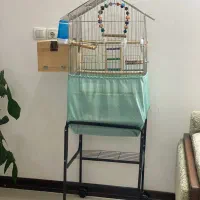 فروش قفس پرنده همراه با لونه و پایه چرخ دار