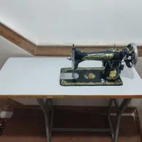 چرخ خیاطی مرد پرنده