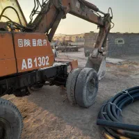 بیل مکانیکی اطلس ۱۳۰۲ لاستیکی