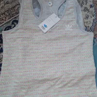 تاپ حلقه ای ورزشی زنانه نایک