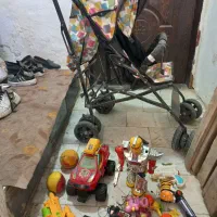 کالسکه بچه و اسباب بازی