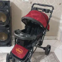 عروسک  کالسکه اسباب‌بازی