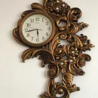 ساعت دیواری طرح چوب