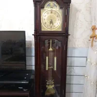 یک عدد ساعت ایستاده و یک جفت باند