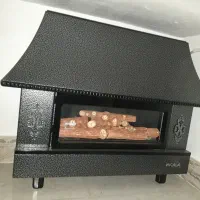 بخاری گازی نیک کالا طرح شومینه