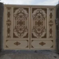 رنگ کاری درب و پنجره و ساختمان