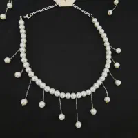 ست گردنبند و گوشواره آویزدار مروارید سنگی دست ساز