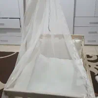 گهواره کنار مادر نوزاد در حد صفر