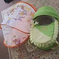 ساک و پشه بند نوزاد