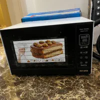 فر برقی دارای جوجه گردان و میوه خشک کن