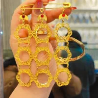 سوزن ملیلیه گوشواره  دستبند ورساچ گردنبند