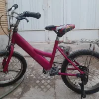دوچرخه صورتی بچگانخ