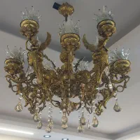 لوستر ۱۵ شاخه برنجی طرح فرشته و لوستر ۴ شاخه برنجی