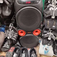 اسپیکر قابل حمل و گوشی هانر