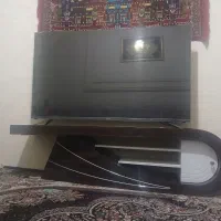 میز و تلوزیون هوشمنده 65 اینچ