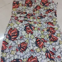 تعداد زیادی پیراهن دخترانه نو