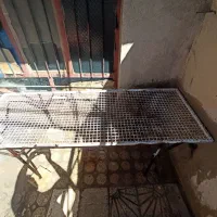 تخت آهنی ومنقل