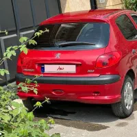 پژو ۲۰۶/تیپ دو/ مدل ۹۰/ رنگ آلبالویی سالم|خودرو سواری و وانت|رشت, نیکمرام|دیوار