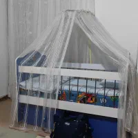 گهواره کنار تخت مادر