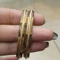 گوشواره ۳گرم گوشواره گل ۴گرم النگو ۷