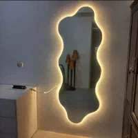 تولیدی انواع آینه دفرمه دکوراتیو با نور LED اردکان