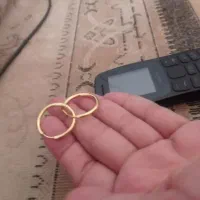 یک جفت گوشواره خوشکل ورنگ تظمینی.