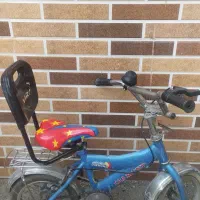 دوچرخه سایز 12سالم همراه کمکی و سبد جلو