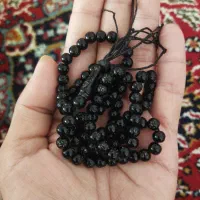 یک عدد تسبیح متبرک شده