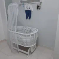 تخت گهواره ای نوزاد