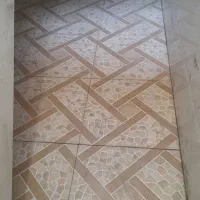 کاشی کاری و رنگ کاری درب آهنی