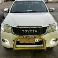 جلو پنجره هایلوکس ویگو