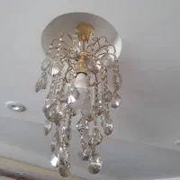لوستر کریستالی تک شعله