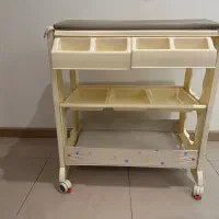 تخت تعویض و وان حمام کودک و نوزاد