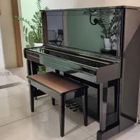 پیانو آکوستیک یاماها مجهز به سیستم دیسکلاویر