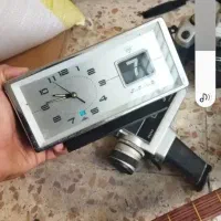 اتیقا ۶۰ساله ساعت تقویم دار دوربین با کیتار قدیمی