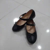 کفش و تخته وایت برد و تخته سیاه