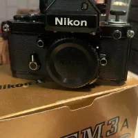 Nikon F2|دوربین عکاسی و فیلم‌برداری|تهران, فلسطین (میدان انقلاب)|دیوار