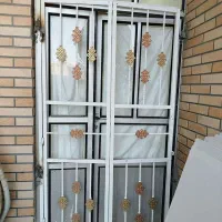 درب آلومینیومی و نرده حفاظ سالم