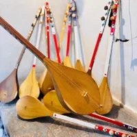 دمبوره هزارگی و قطغنی|سازهای سنتی|باقرشهر, |دیوار