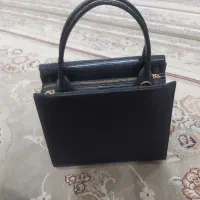 کیف|کیف، کفش، کمربند|بندر دیر, |دیوار